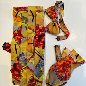 Silk Cummerbund with 2 matching bow ties.